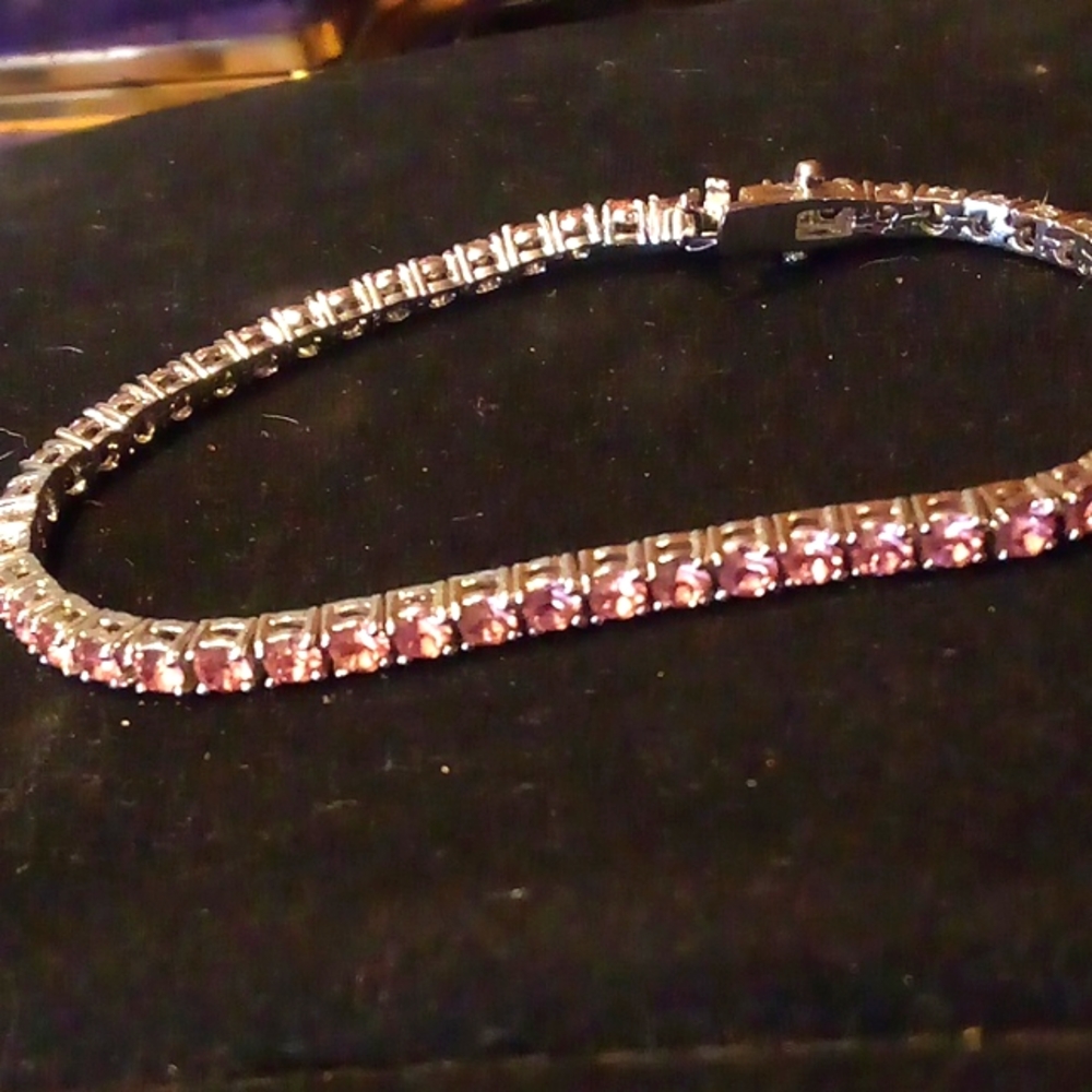 Gorgeous Joan Rivers silver tennis bracelet with pink crystals